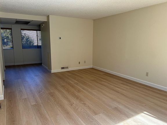 Living room is attached to dining room