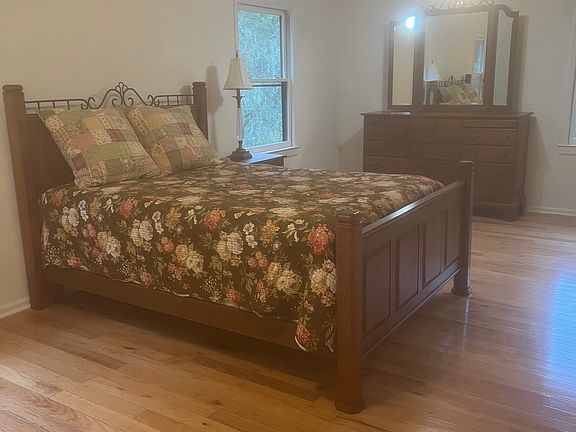 This bedroom is very large. The wall between two bedrooms was removed.