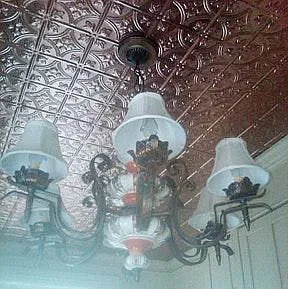 Copper ceiling and antique light fixture