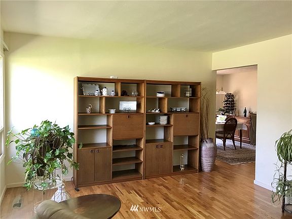 Living room with a peak into the dining  area 
