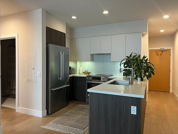 Kitchen with stainless steel appliances