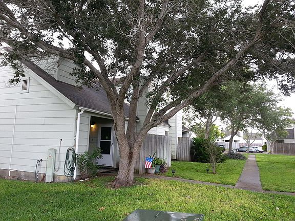 Set back off the road and parking areas, unit sits in beautifully kept lawn.