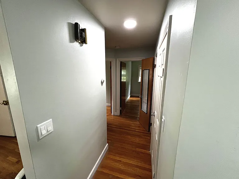 Hallway leading to bathroom and bedrooms