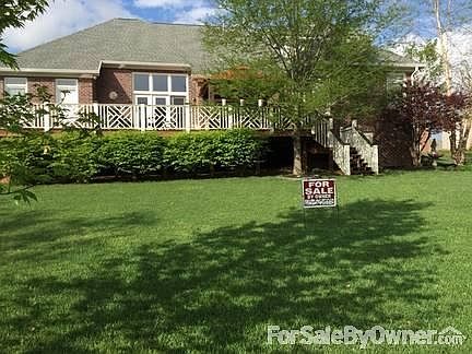 Back yard backs up to green space
						:
						Oversized deck, canvas gazebo, storage space with 12x12 concrete pad, .33 acre