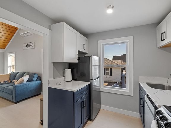 The kitchen has plenty of room for cooking meals.