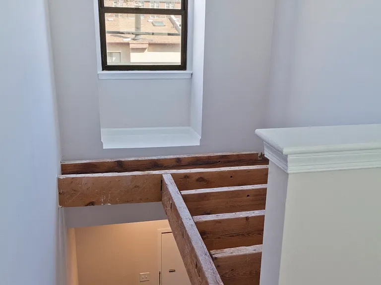 Lofty 19-ft ceilings with timbered beams