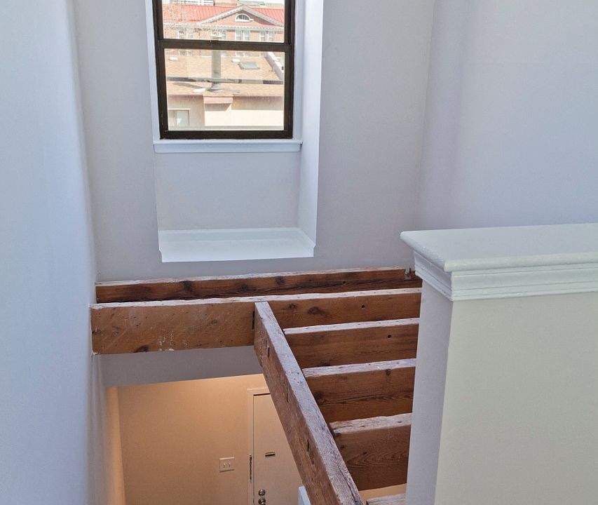 Lofty 19-ft ceilings with timbered beams