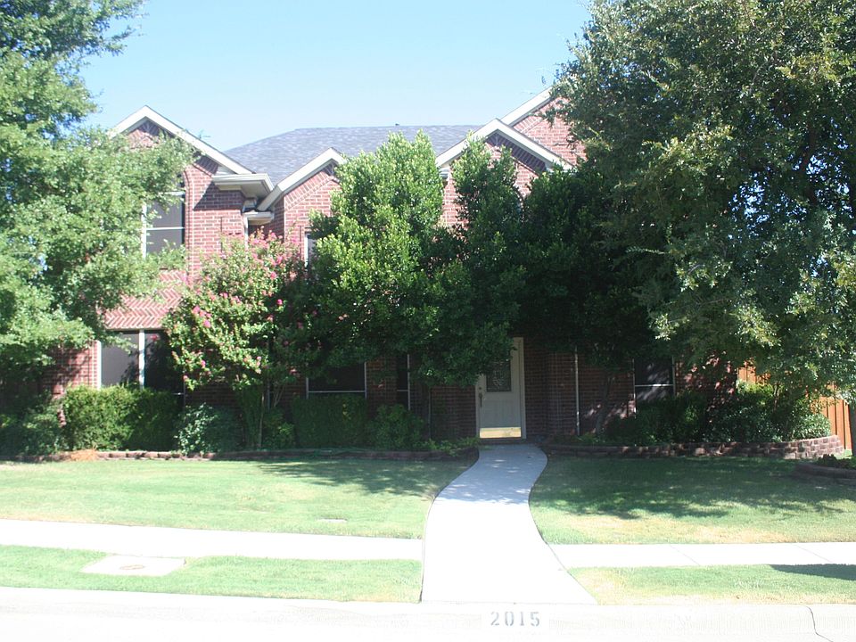 Front view with trees for shade
