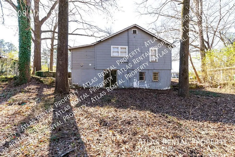 Cozy 2BR Home with Modern Amenities & Inviting Front Porch! — Photo 4