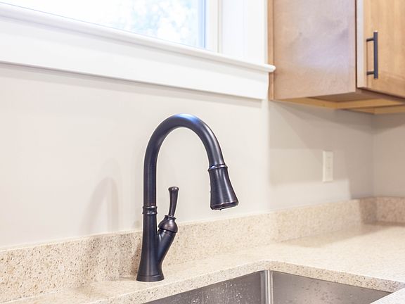 Oil rubbed bronze fixtures.