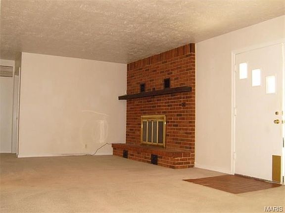Expanded living room with fireplace