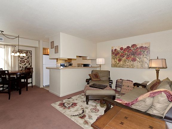 Living room, see thru to kitchen; dining room. 
(Furnishings not included.)