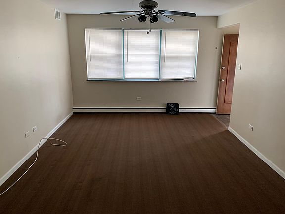 Living Room (facing street) Front door located to the right