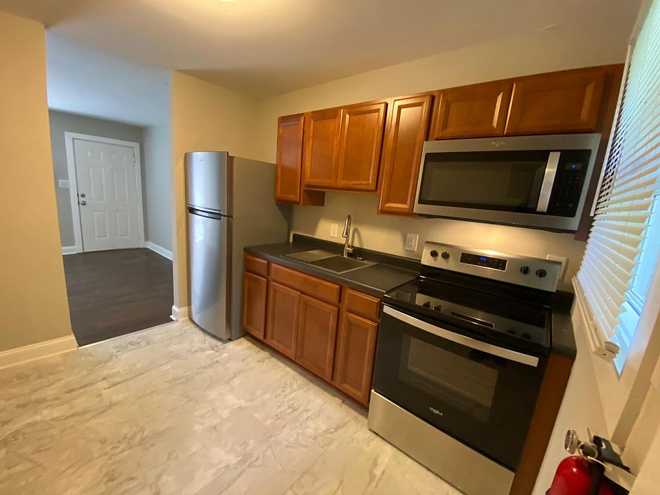 Kitchen looking into living room