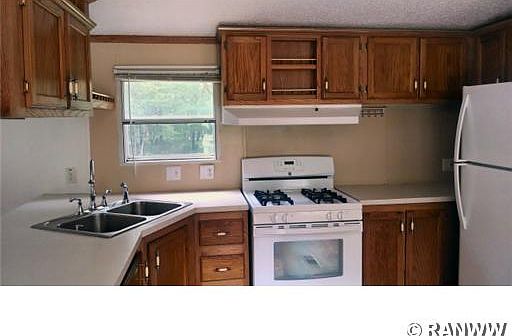 3rd image of 9847 N Tranus Lake Road