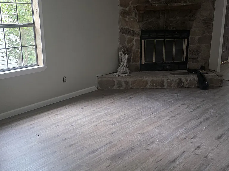 Corner fireplace in large main living area