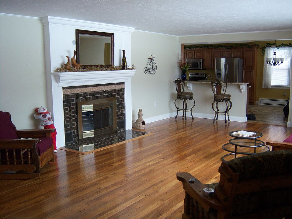 Pegged wood floor/ Fireplace