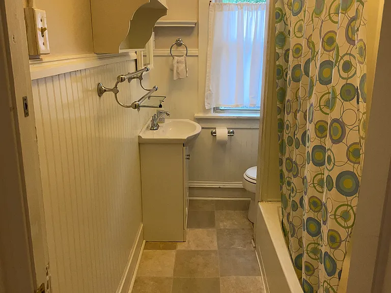 Full upstairs bath with tub and shower