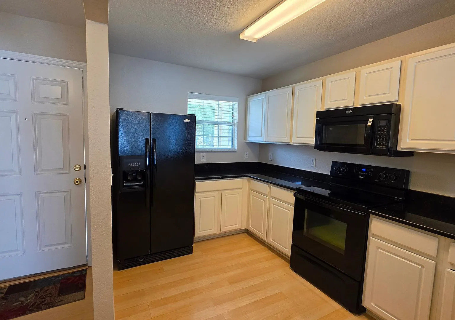Charming 3-Bed, 2-Bath Home Near The Villages | Gated Community Living — Photo 4