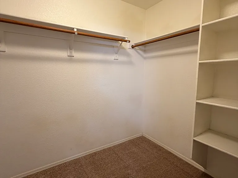 PRIMARY WALK IN CLOSET