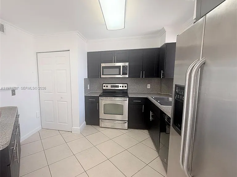 6155 NW 186th St #308 — Photo 4