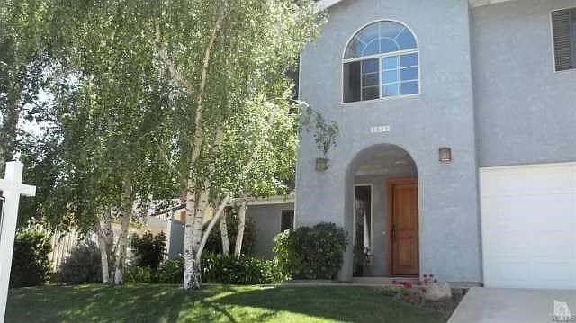 This home is absolutely 'Model-Perfect'! 5 bedrooms, 3 baths, office, step-down living room with vau