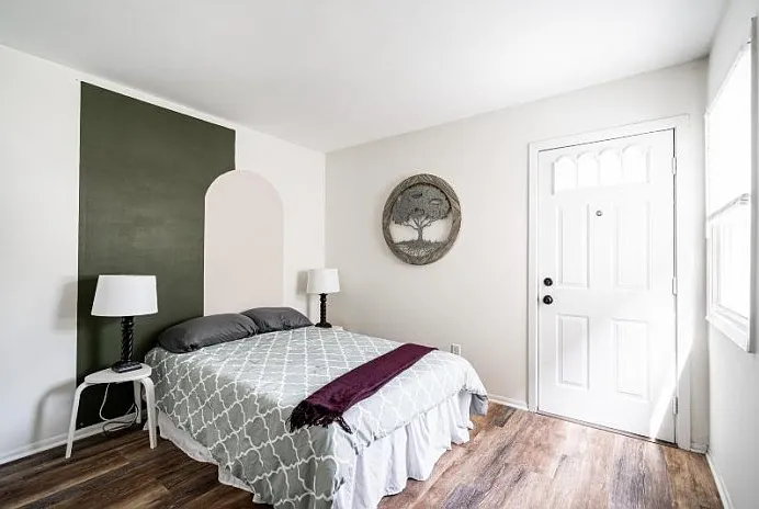 Bedroom 1 with access to private deck