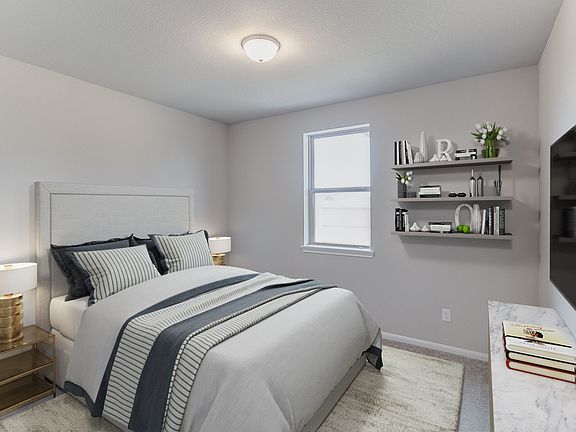 Secondary bedroom. Note Sample product photo - actual exterior and interior selections may vary