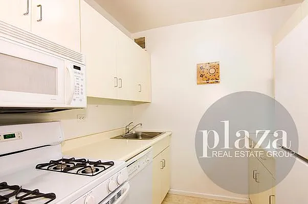 Sold by Plaza Real Estate Group | media 9