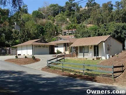 Front View of Garage, Main & Guest Qrts