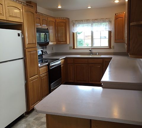 kitchen with corian counters