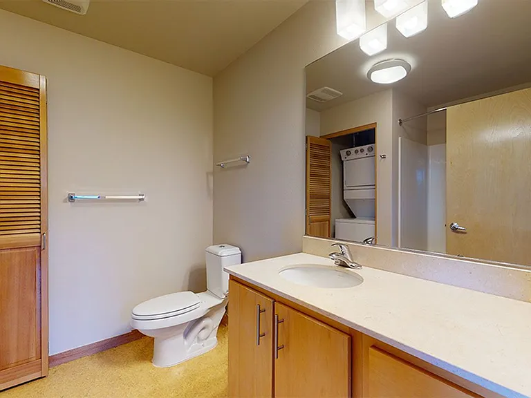 Apartment Bathroom with large soaking tub.