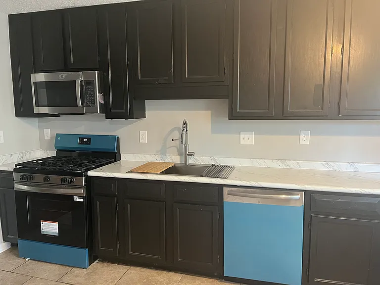 New upscale sink and garbage disposal.