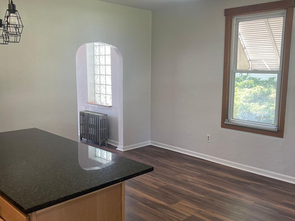 Dining room with bar into open kitchen