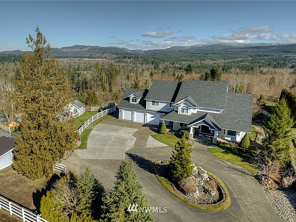 Sweeping views, majestic and amazing piece of paradise. 3 car attached garage with detached 3 car shop including small office & carport + 200 sq ft hayshed & dog run! Did we mention the places for horses?