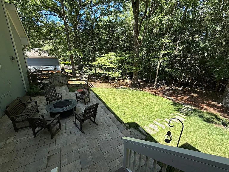 New stone patio, backyard (view from screened-in porch steps)