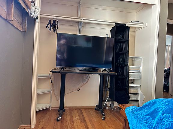 closet & TV with streaming apps included