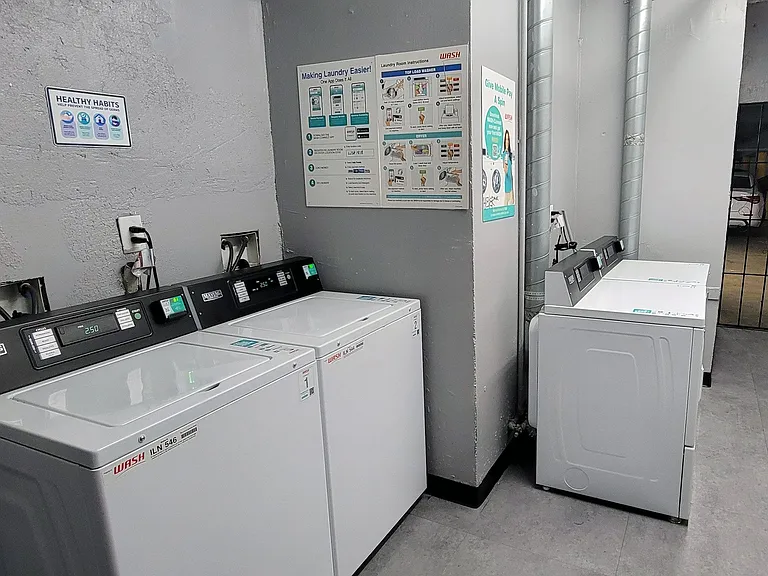 Laundry room washing machiines at The Carlton Apartments in Hollywood, California.