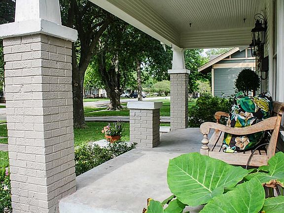 Welcoming wide front porch gives you a perfect spot to sit and enjoy the outdoors.