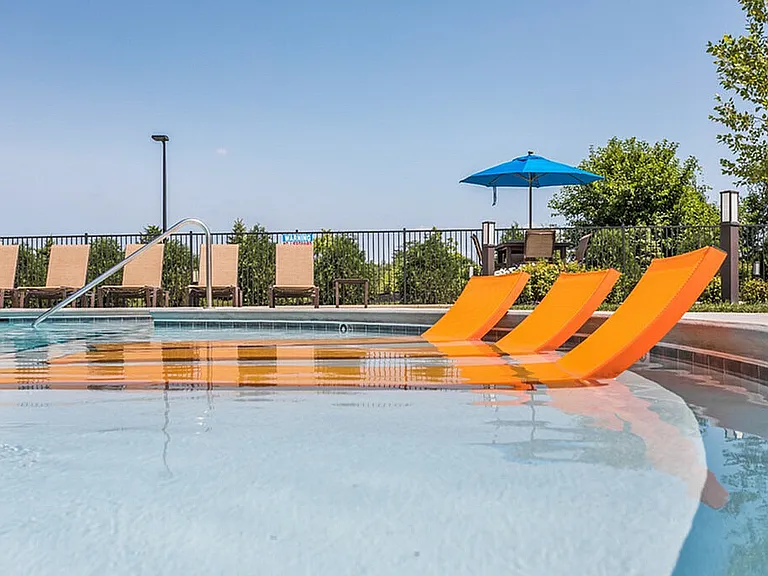 Cool feature alert: our Fishers apartment pool has built-in underwater loungers for maximum chill time.