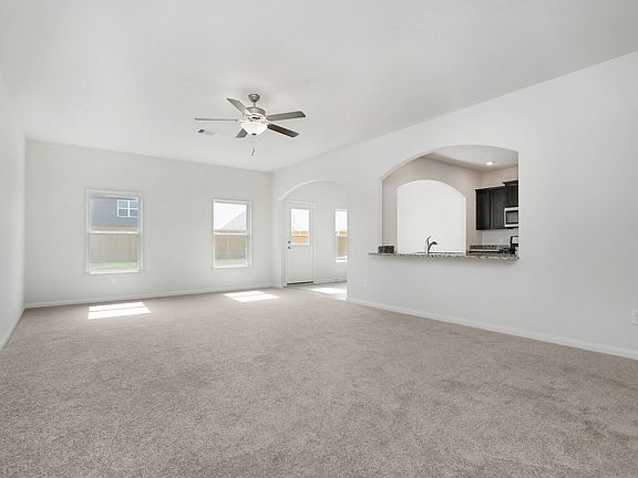 The spacious family room is ready to host all your gatherings