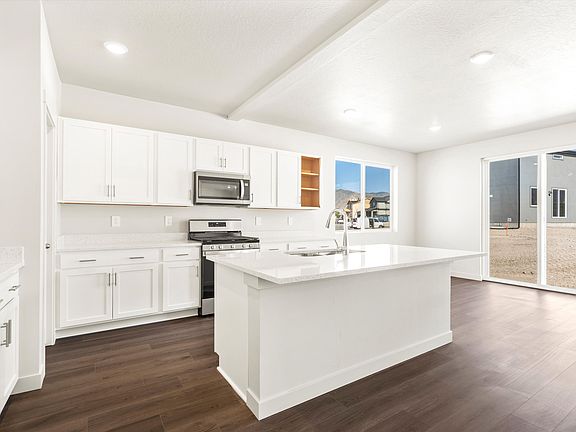The Bryce floorplan interior image taken at a Meritage Homes Community in Tooele, UT.