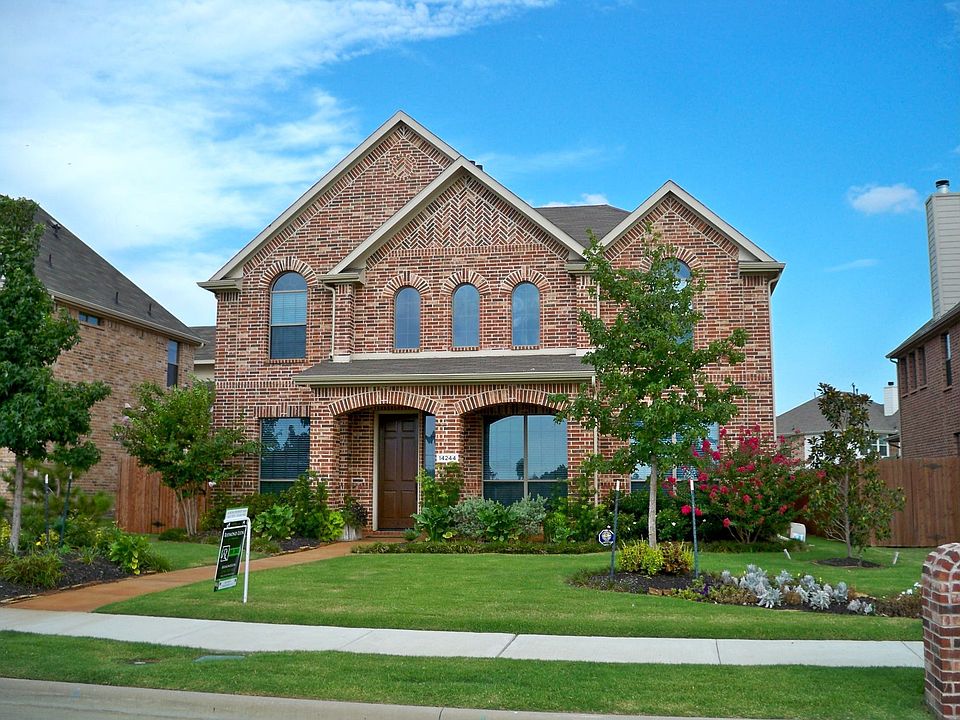 Inviting Curb Appeal with over $10,000 in Beautiful Landscaping