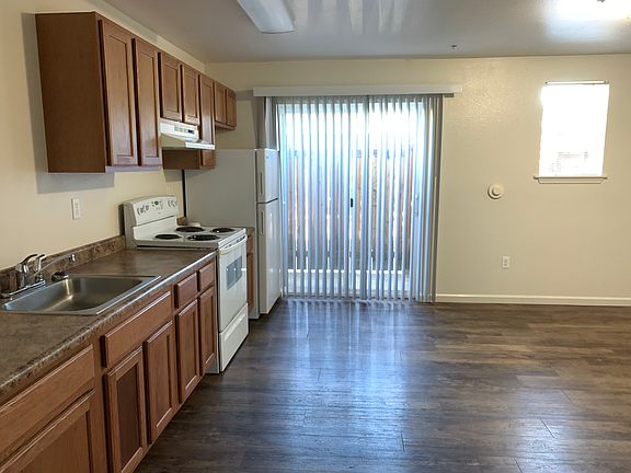 Downstairs unit kitchen with private patio.