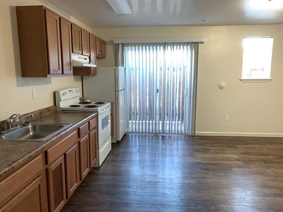 Downstairs unit kitchen with private patio.