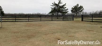 view from back yard looking out at pasture