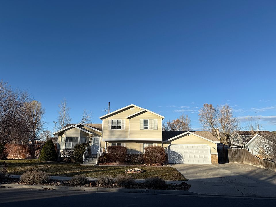 Front House with front entrance. Extra parking space on the driveway. Two car garage.