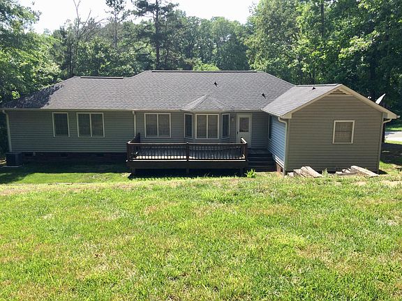 Large back yard with deck.