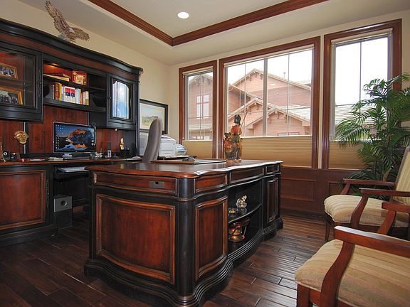 Main Floor Study - handscraped wood floors, stained casing & crown molding