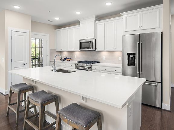 Large Kitchen Island in the New, Brooklyn Condo located in Herndon, VA.